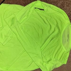 Front is plain green back has under Armour down the spine